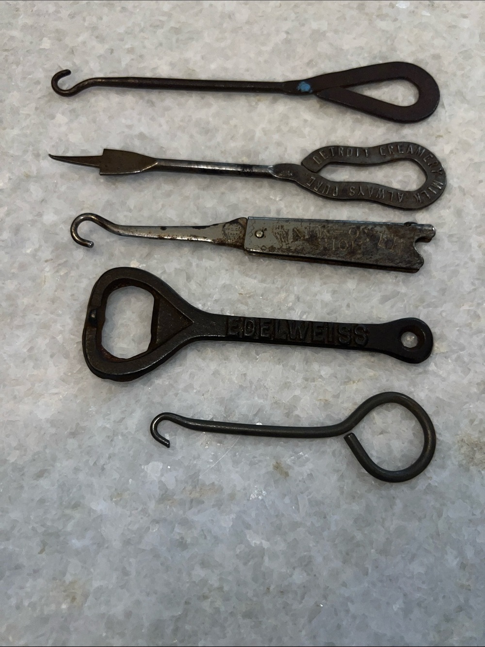 Antique 1900’s button fasteners and bottle opener